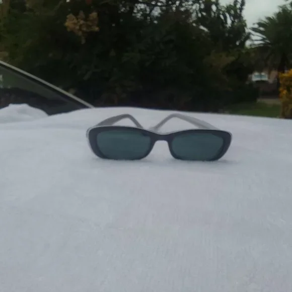 Luxury collector's delight two-tone mini-style unique sunglasses brand new.